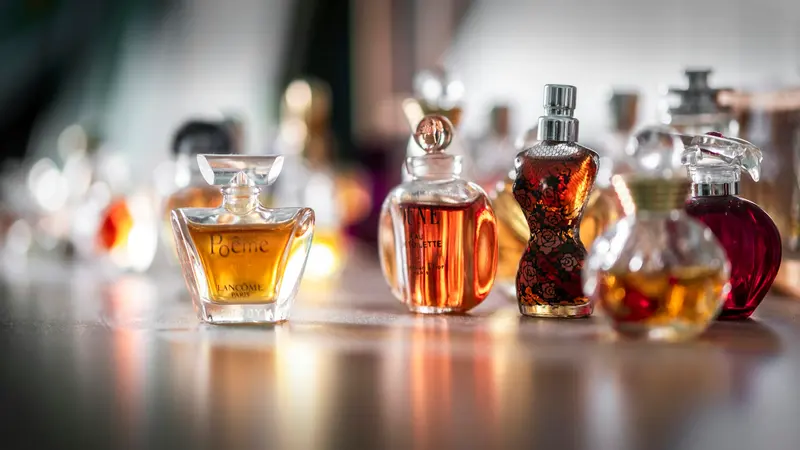 A collection of glass perfume bottles on a table